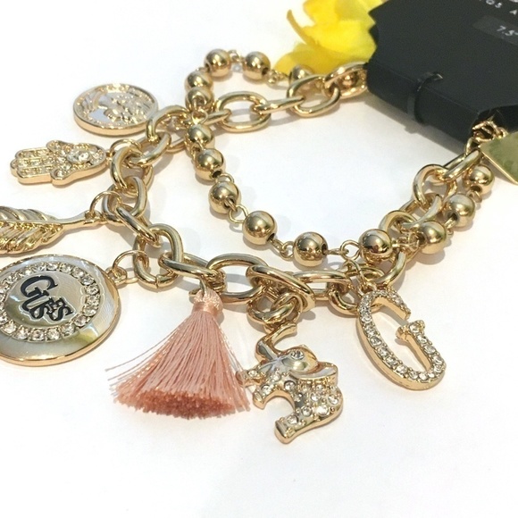 3/$29! GUESS Charm Bracelet Tassel, Elephant, Leaf - Picture 5 of 7